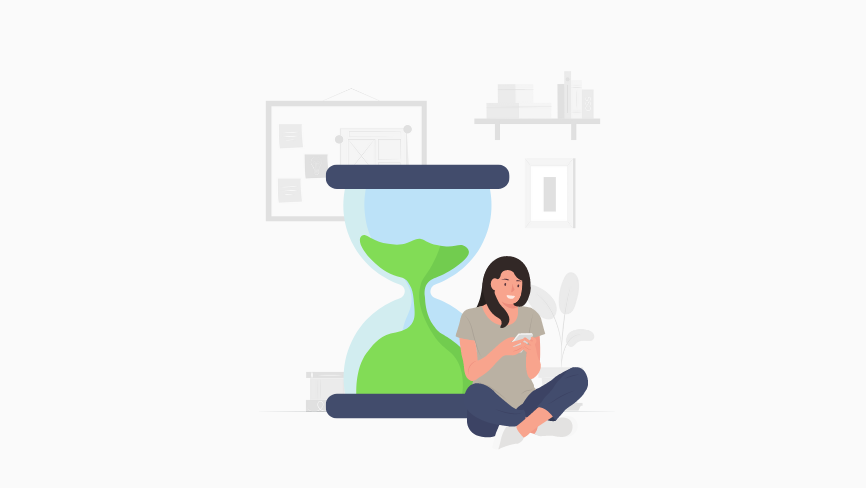 A woman sitting on the floor with a phone in her hand, looking at her app.